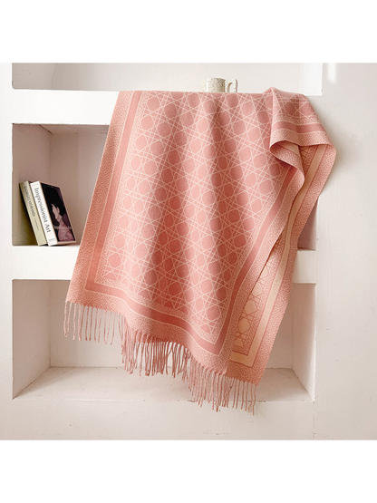 Light Pink abstract-line scarf with framed border and fringed ends, draped display