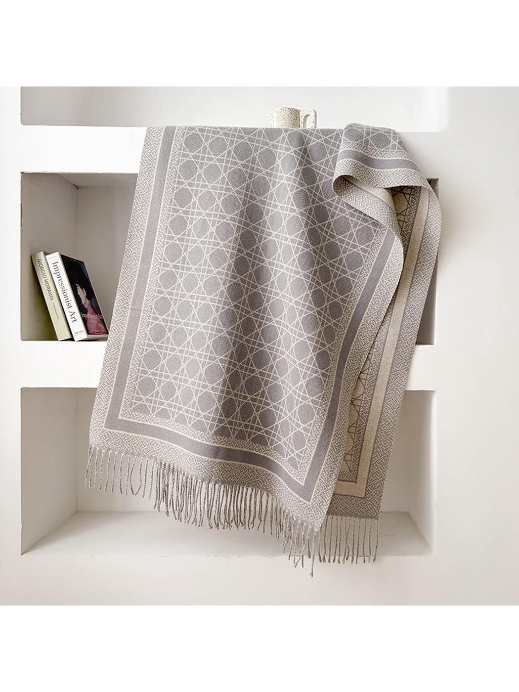 Light Gray abstract-line scarf with framed border and fringed ends, draped display