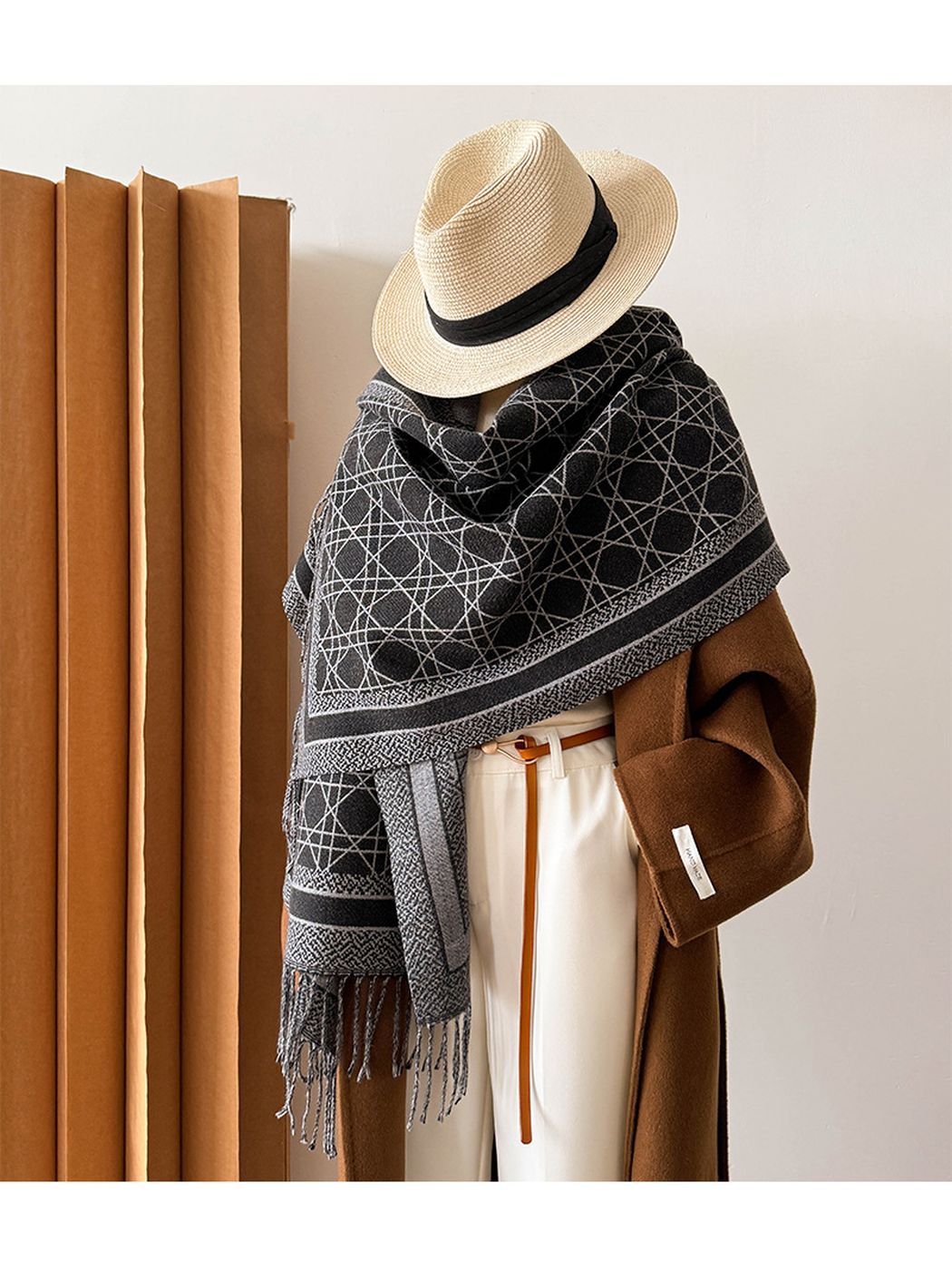 Black Gray abstract-line scarf styled as a broad shoulder wrap on a mannequin