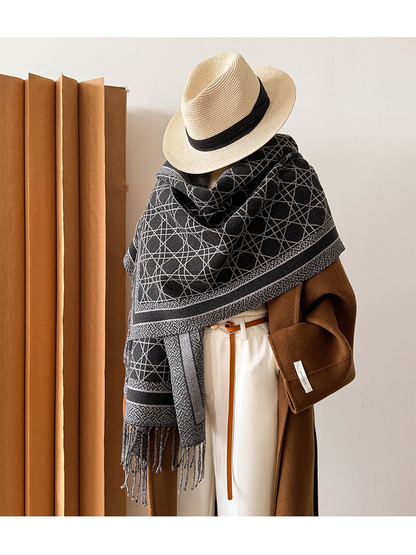 Black Gray abstract-line scarf styled as a broad shoulder wrap on a mannequin