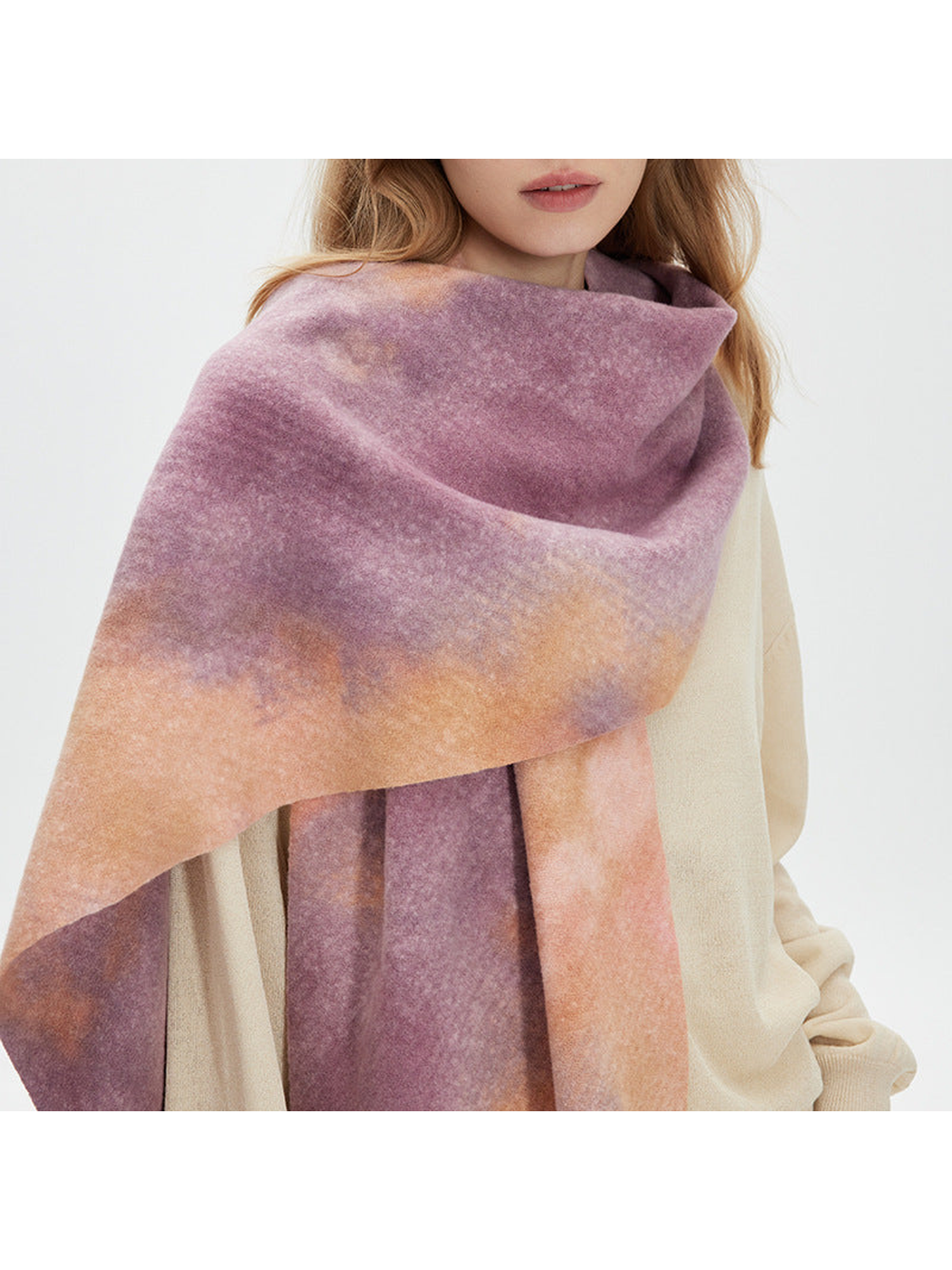 Caramel abstract scarf styled in a wide shoulder wrap