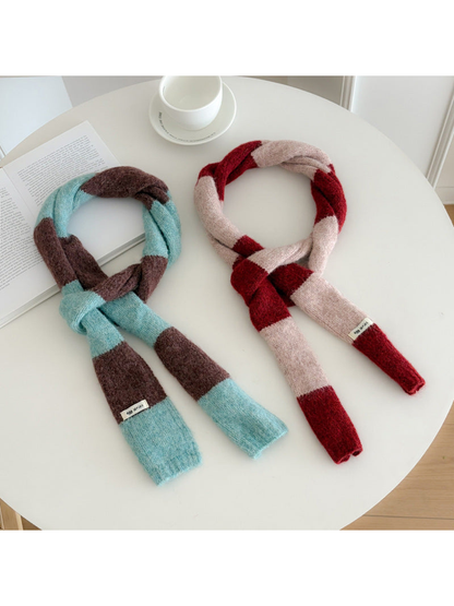 Blue Brown and Red Pink striped narrow scarves arranged in knotted styles
