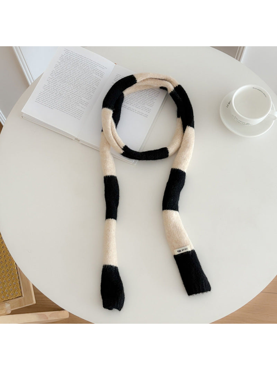 Black Ivory wide-striped narrow scarf displayed at full length
