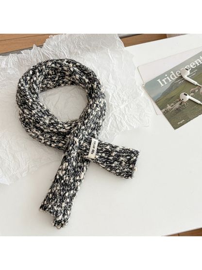 Black Gray narrow textured scarf arranged in a loop