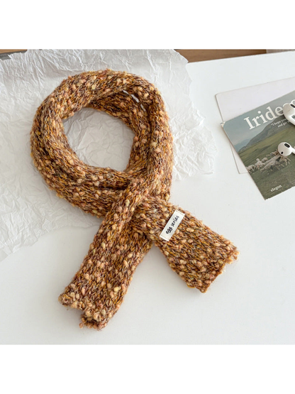 Orange Yellow narrow textured scarf arranged in a loop