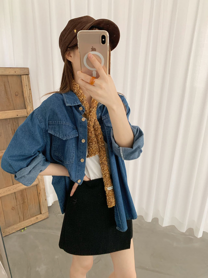Orange Yellow narrow scarf styled with a denim shirt and dark skirt