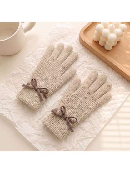 Greige ribbed gloves with contrasting bow details