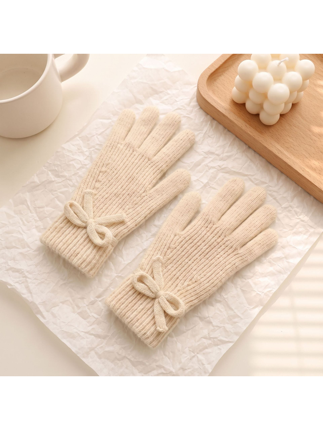 Cream ribbed gloves with matching bow details