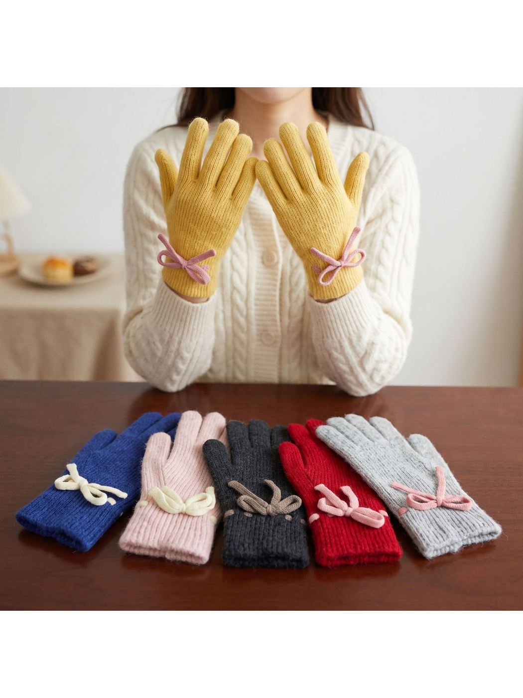 Multiple colors of ribbed bow-detail gloves displayed together