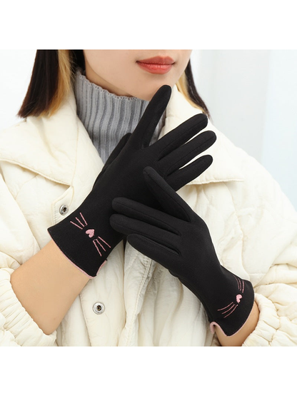 Black cat-motif gloves worn in a crossed-hand view