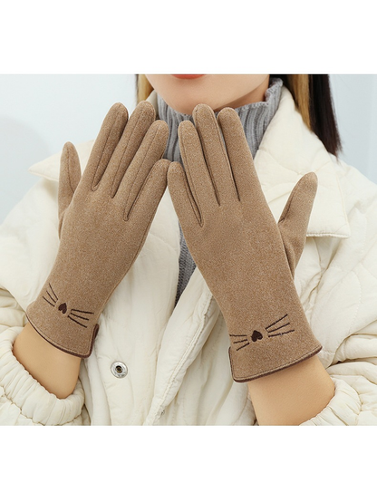 Khaki cat-motif gloves worn with both backs facing forward