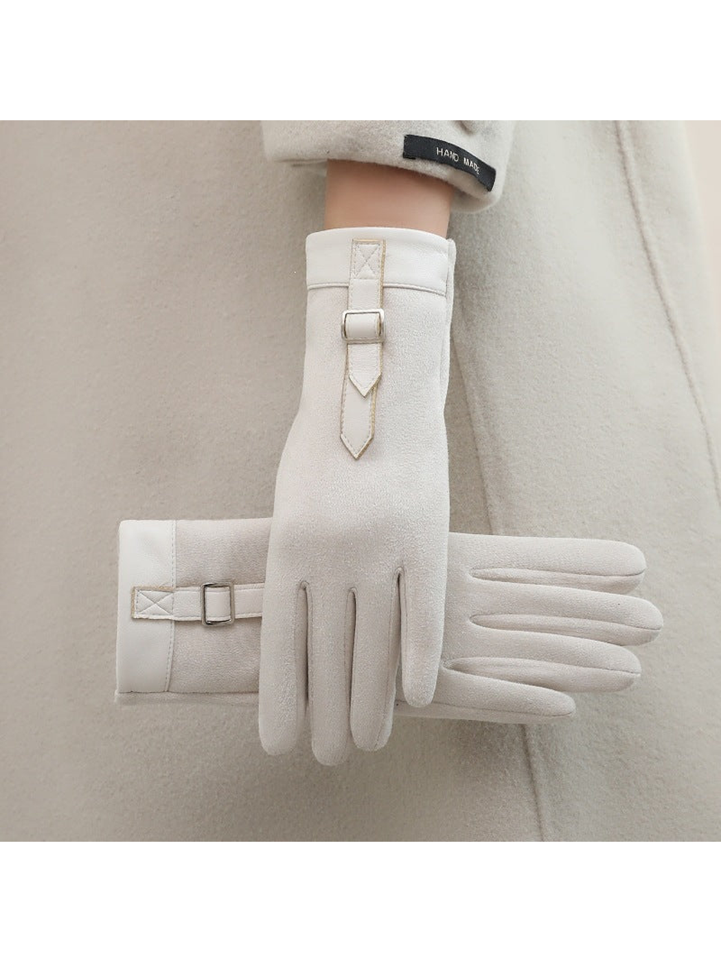 Cream gloves with matching cuffs and buckle straps