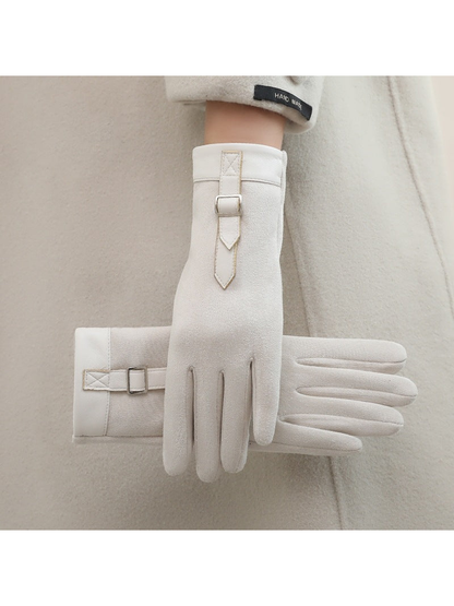 Cream gloves with matching cuffs and buckle straps