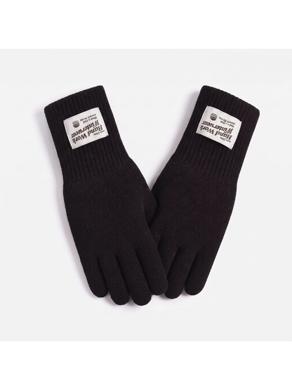 Black knit gloves with extended ribbed cuffs, front view