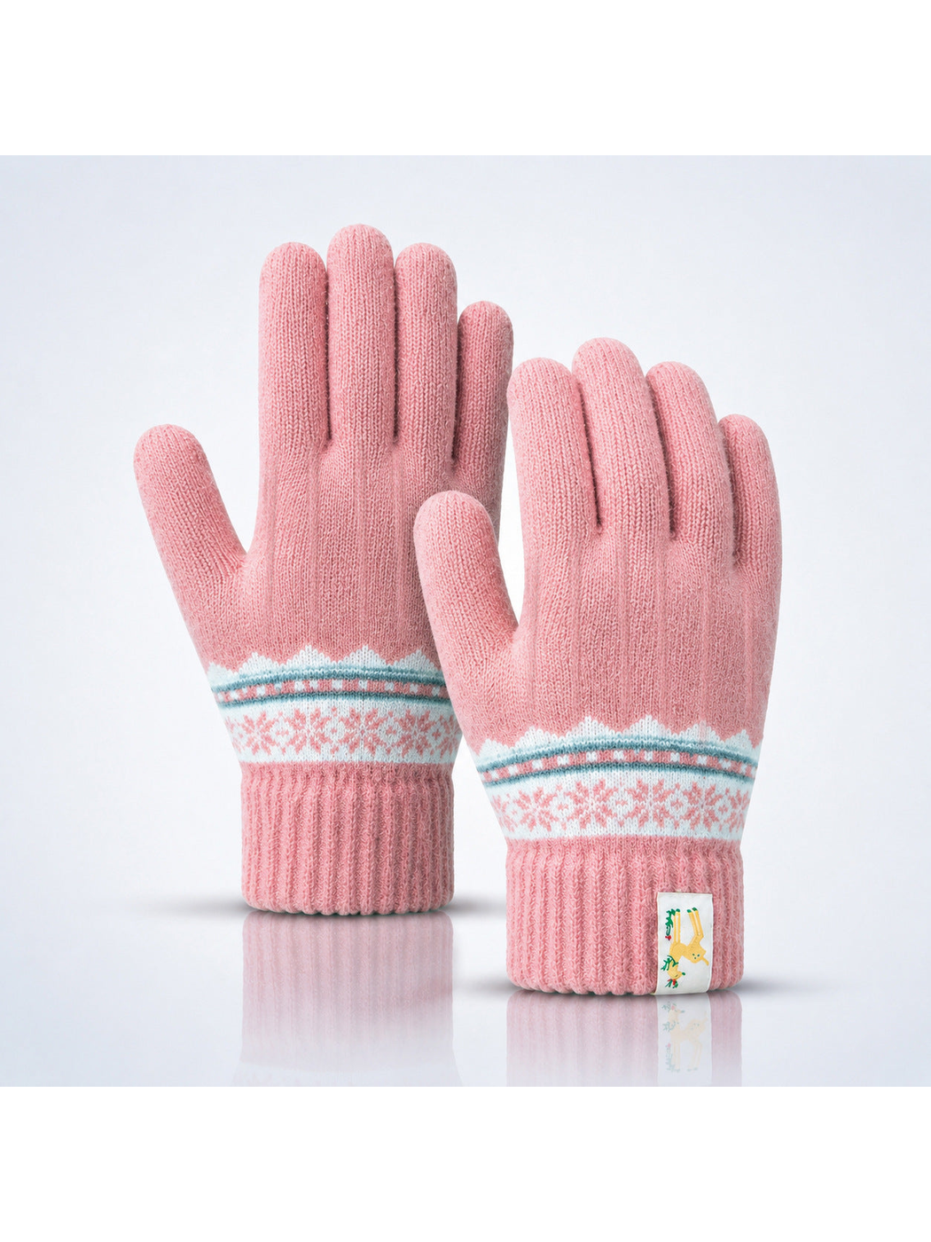 Pink knit gloves with white and gray geometric wrist bands
