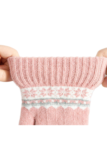 Close-up of the pink glove's ribbed cuff being stretched