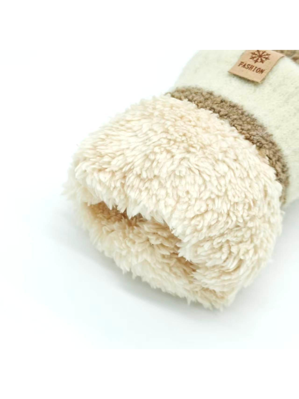 Close-up of the plush cream mitten interior and contrasting cuff