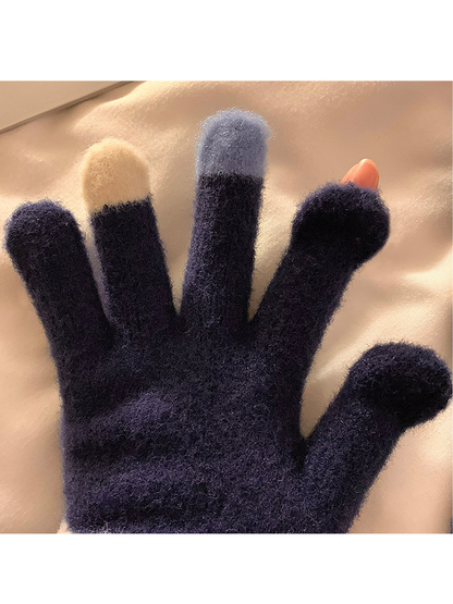 Close-up of the Navy glove's fuzzy texture and open fingertip slots