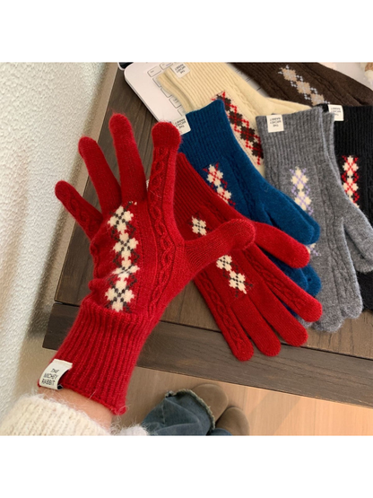 Red patterned glove worn beside the available colors