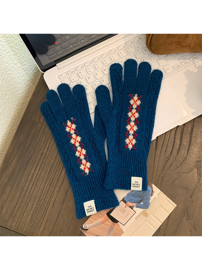Teal blue cable-textured gloves with a contrasting diamond motif