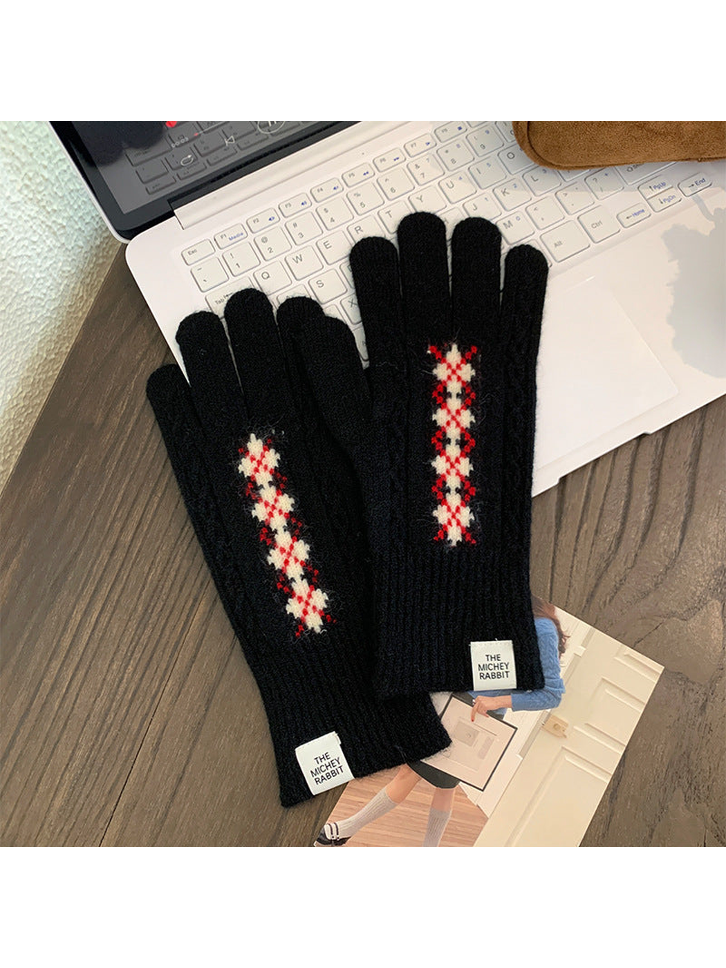 Black cable-textured gloves with a red and ivory diamond motif