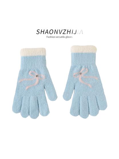 Light Blue gloves with pink bow motifs and contrasting cuffs