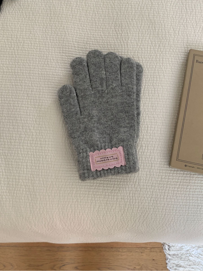 Heather Gray fuzzy knit gloves with ribbed cuffs and pink labels