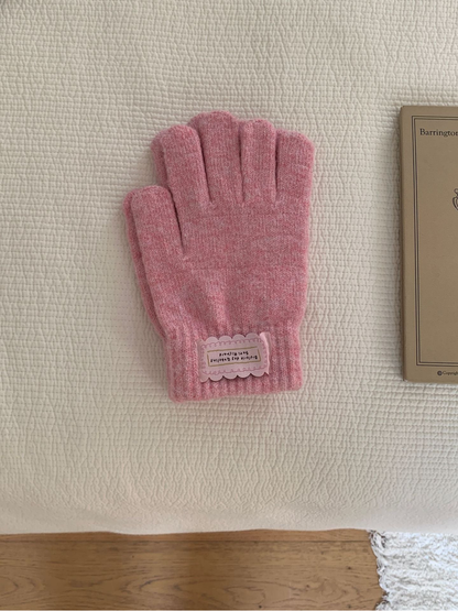 Dusty Pink fuzzy knit gloves with ribbed cuffs and pink labels