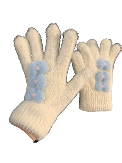 Ivory fuzzy gloves with blue flower appliqués and ribbed cuffs