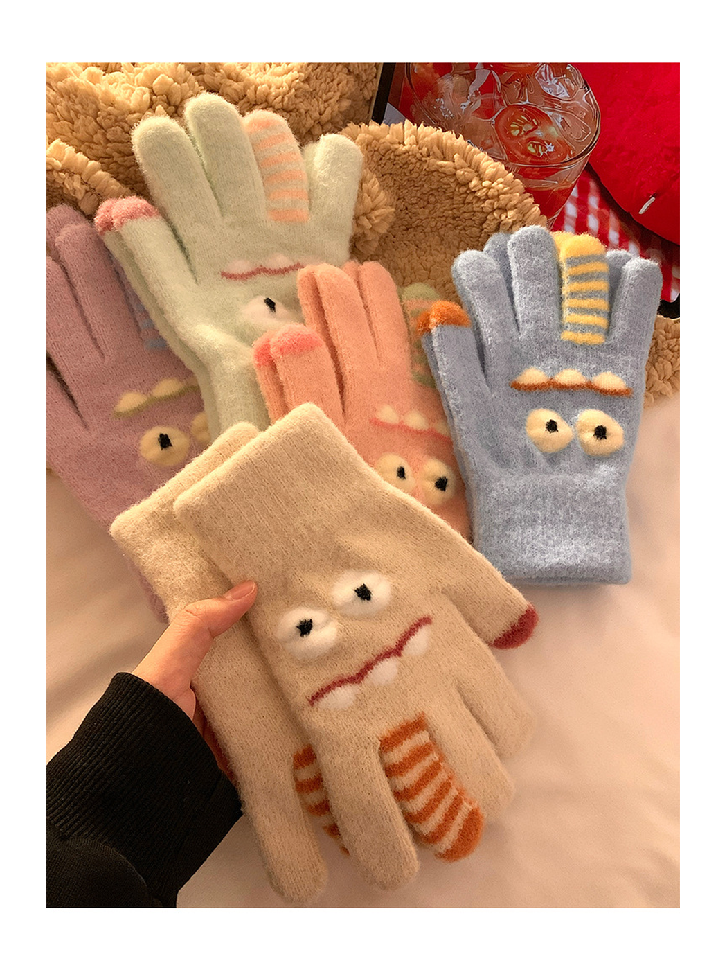 Multiple cartoon monster glove colors displayed with palm and back views