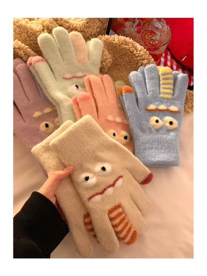 Multiple cartoon monster glove colors displayed with palm and back views