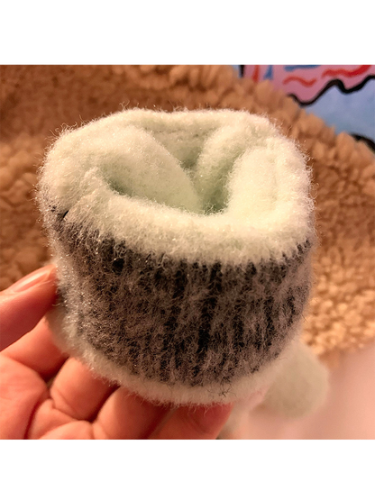 Close-up of the ribbed cuff opening and fuzzy inner surface