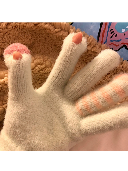 Close-up of small fingertip openings on the Mint gloves