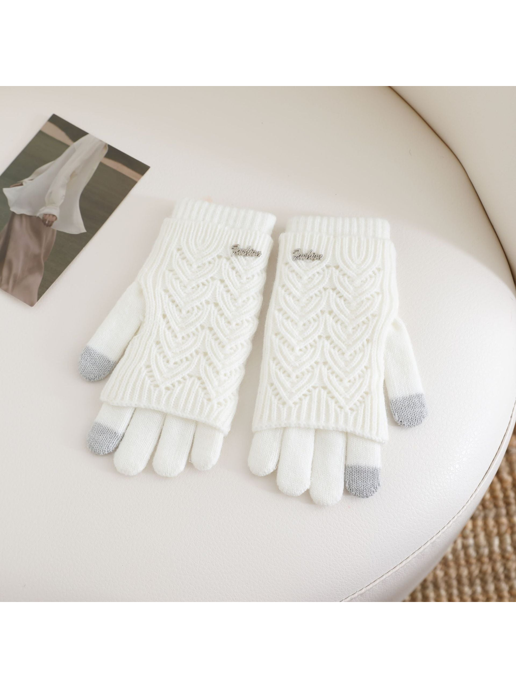 White openwork layered gloves with gray contrast fingertips, front view