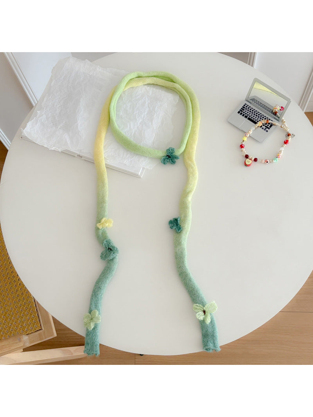 Green gradient knit scarf with butterfly appliqués, full view