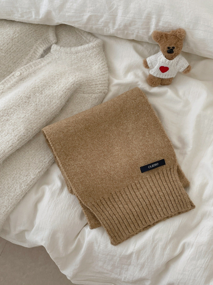 Camel textured scarf with wide ribbed ends, folded display