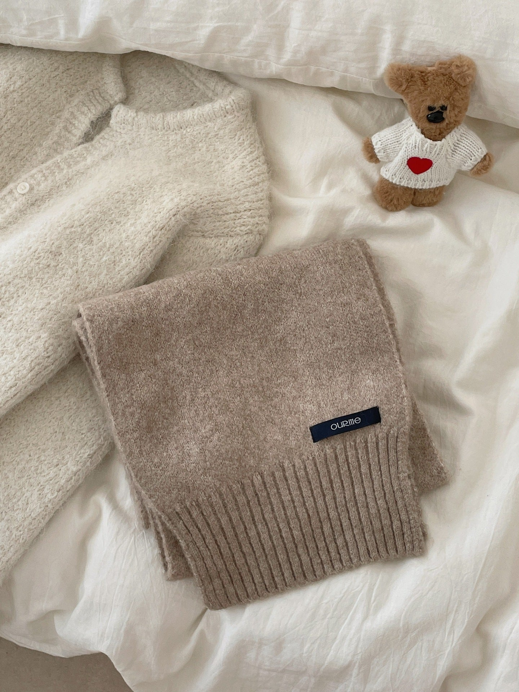 Greige textured scarf with wide ribbed ends, folded display