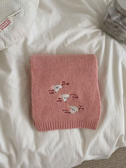 Dusty Pink knit scarf with embroidered dog faces and ribbed edging