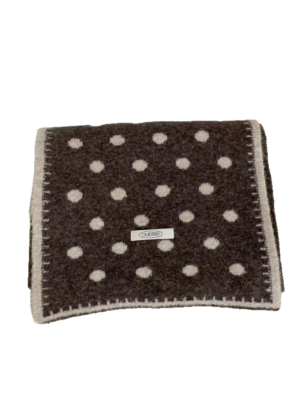 Brown and ivory polka-dot scarf folded on a white background