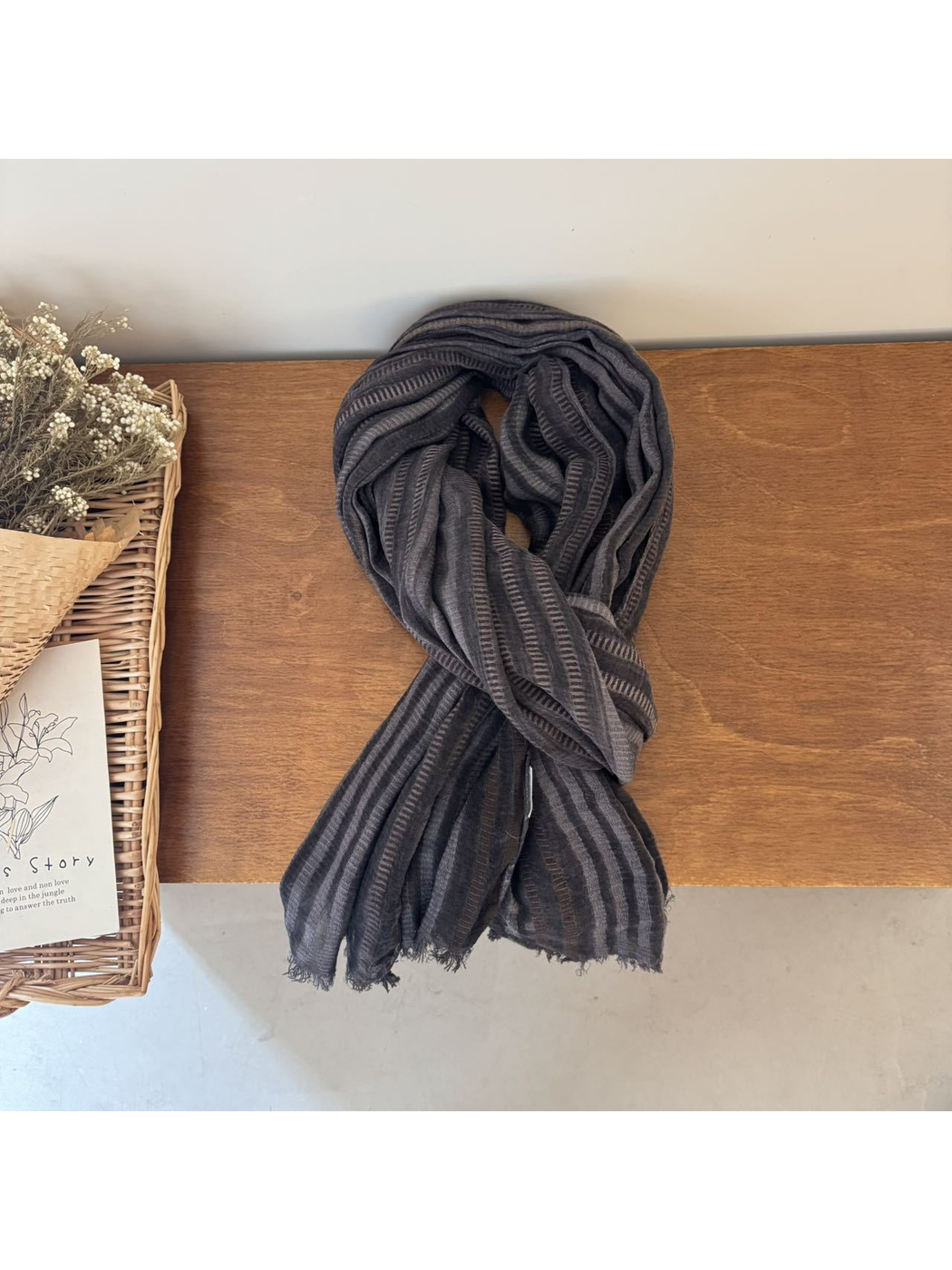 Black striped scarf with openwork bands and short fringe