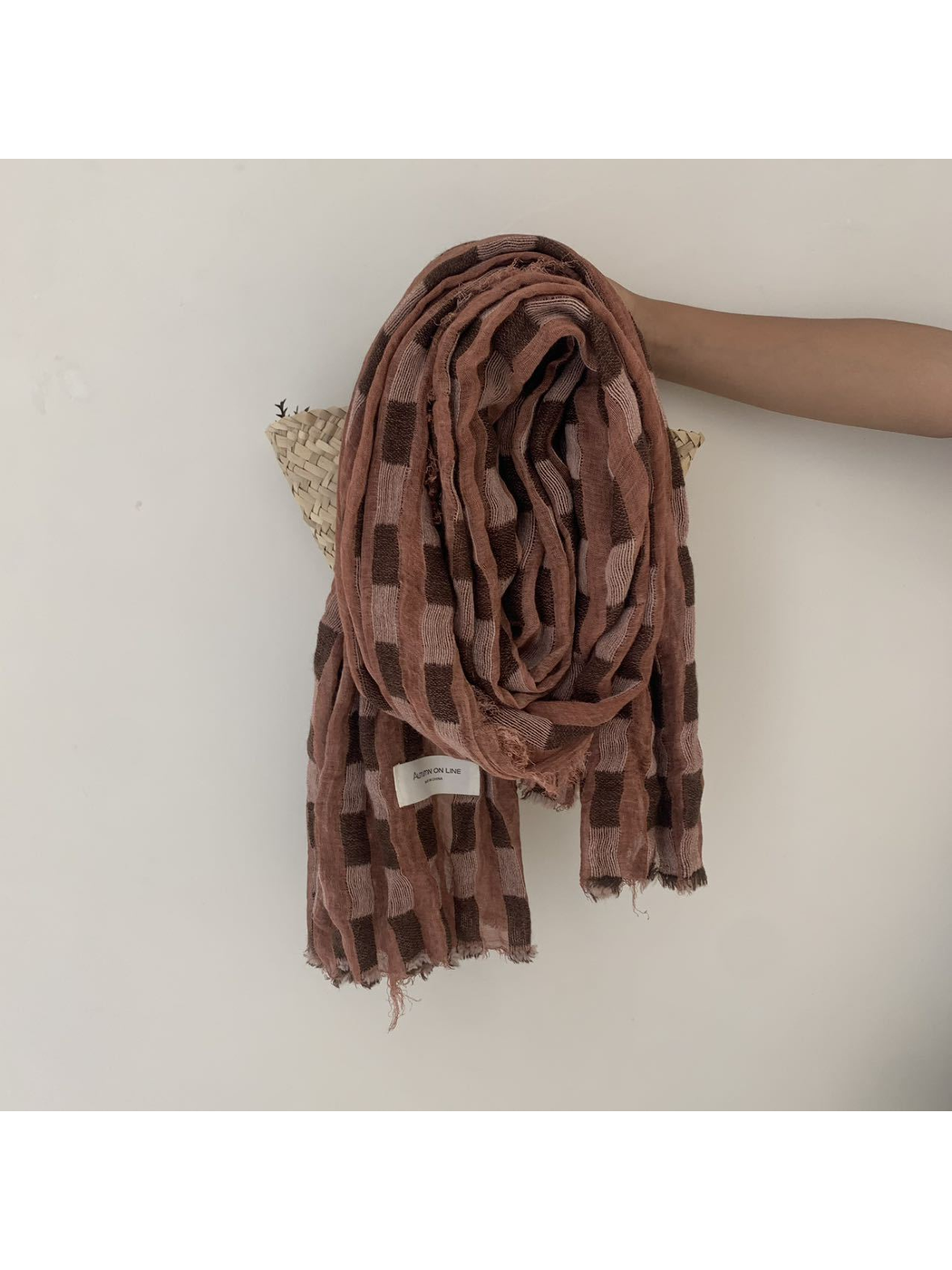 Orange Red scarf with rectangular block pattern and frayed edges