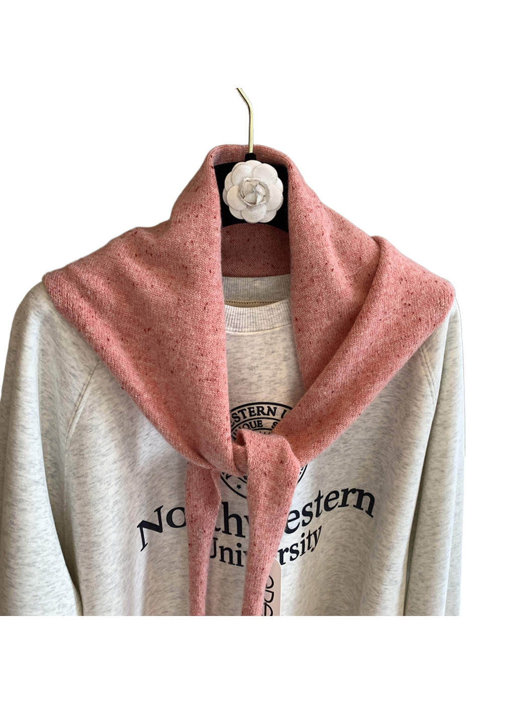 Close-up of the Dusty Pink scarf's tied front and flecked knit texture