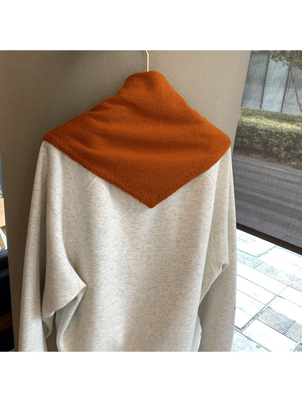 Back view of the Orange scarf's triangular body