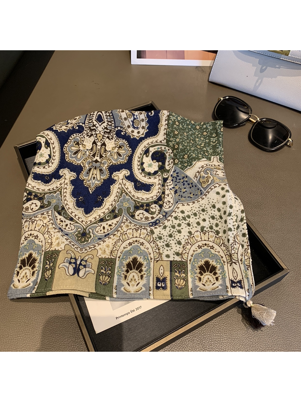 Daisy square scarf with blue, green and cream ornamental pattern and corner tassels
