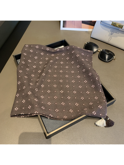 Brown square scarf with repeating floral motifs and corner tassels