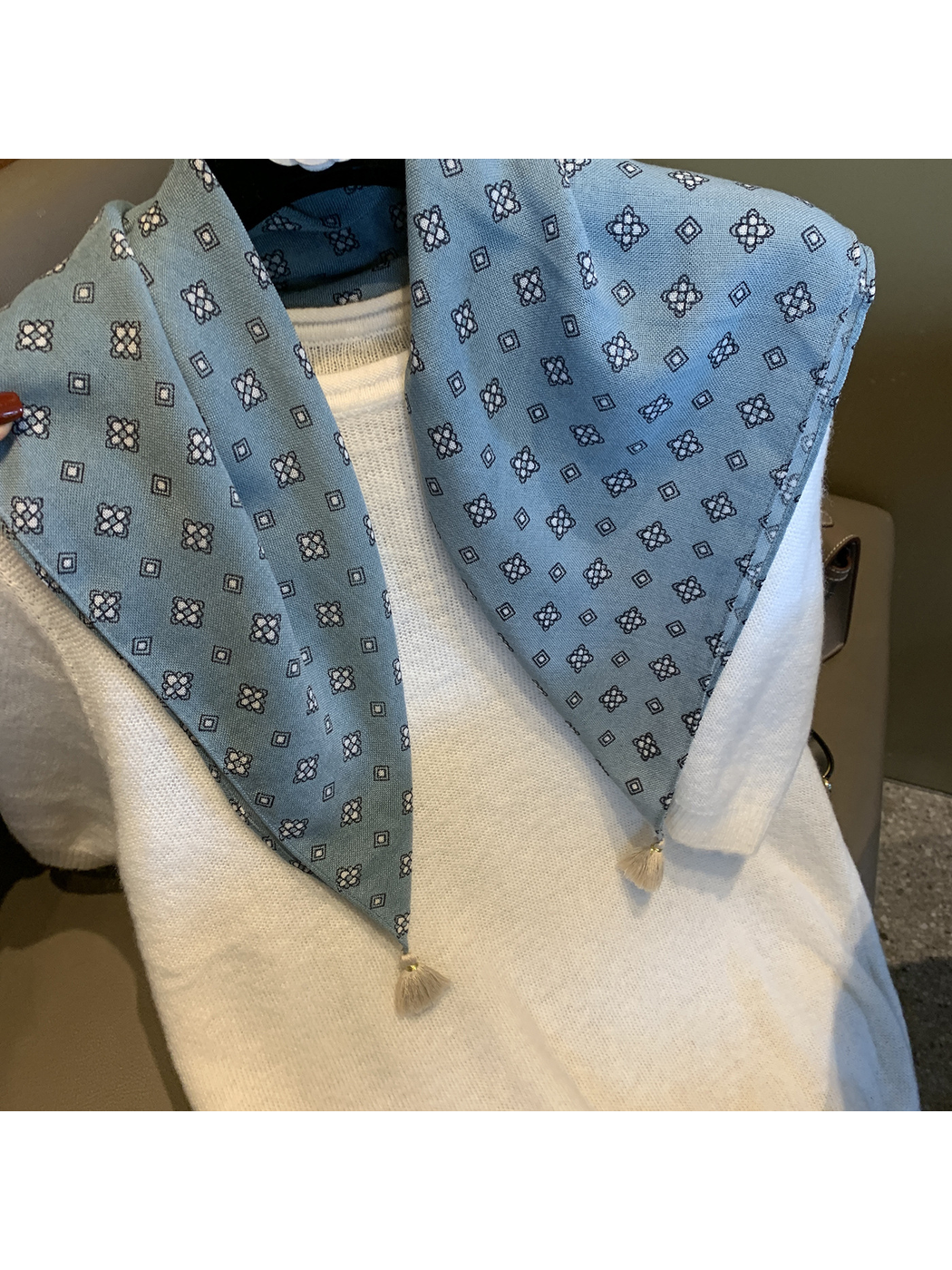Close-up of the Blue scarf's floral and diamond pattern