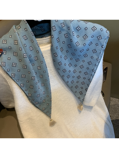 Close-up of the Blue scarf's floral and diamond pattern