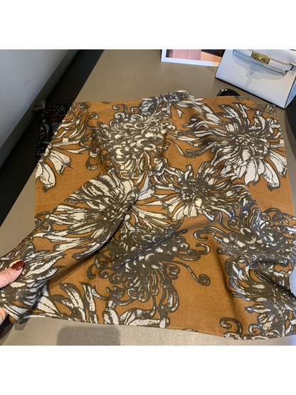 Warm brown square scarf with large floral print and finished edges