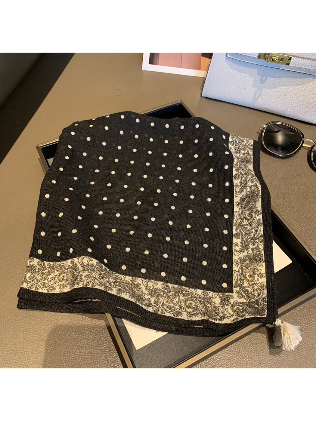 Black polka dot square scarf with paisley border and tassel-trimmed points