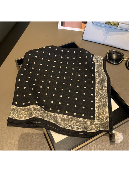 Black polka dot square scarf with paisley border and tassel-trimmed points